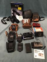 Miscellaneous cameras and flashes, mostly cased - Olympus IS-1000, Kodak A127, Adventist, Beaton,