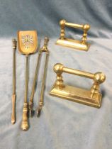 A set of Victorian brass fire irons with ribbed handles - poker, tongs & shovel; and a pair of brass