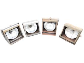 A set of four mid-century Strand Electric pattern 137 theatrical floodlights. (10in x 9.5in x