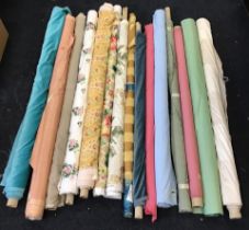 Fifteen rolls of upholstery, curtain and decorative material with velvet, polished cotton,