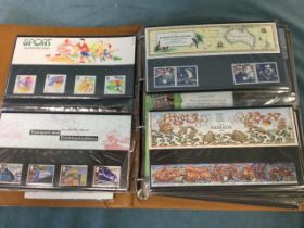 A stamp album containing sets of presentation packs of British commemorative stamps, 1980s-90s. (