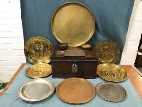 Miscellaneous metalware - a Victorian grained tin trunk, embossed brass wall plaques, various beaten