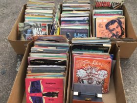 A collection of vinyl LPs, mainly classical from the 70s, Edith Piaf, Tom Lehrer, some singles and