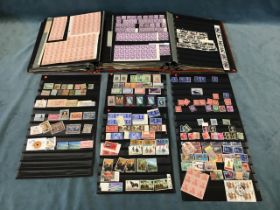 A stamp collection in two albums - large un-torn sheets, the Falklands, Spanish, Prussian, Polish,