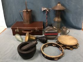 Miscellaneous western style campfire gear - water bottles, a horn, tambourines, an iron coffee