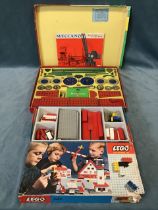 A 1960s boxed Meccano 5 set, complete with instruction manual; and a 1970s boxed Lego 040 building