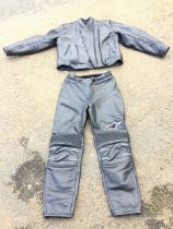 A motorcycle leather suit - jacket by Frank Thomas - size UK16, and pants by Alpine Stars size