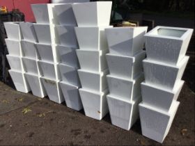 31 square tapering plant pots with flat rims on pad feet - A/F. (31)