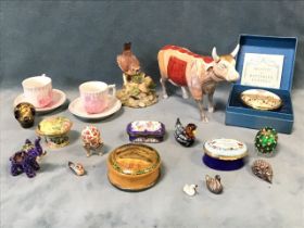 Miscellaneous miniature ornaments - Halycon Days enamelled boxes, eggs on stands, a pair of