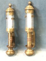 A pair of brass GWR style copper labelled candlelamps with tubular glass shades and pieced covers,