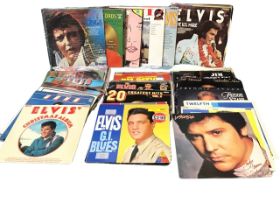 A collection of vinyl LPs, male vocalists including Elvis Presley, Gene Pitney, Neil Diamond, Jim