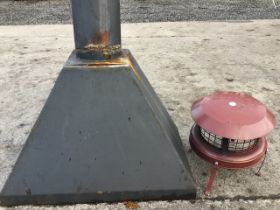 A rectangular tapering stove canopy with angled length of tubular flue; and a chimney cap on four