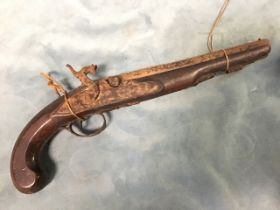 A C19th percussion cap pistol by Jackson, the walnut stock with steel barrel and lock, the plate