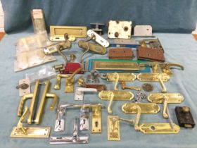 A collection of miscellaneous door furniture - old rimlocks, brass, unused, mortice locks,