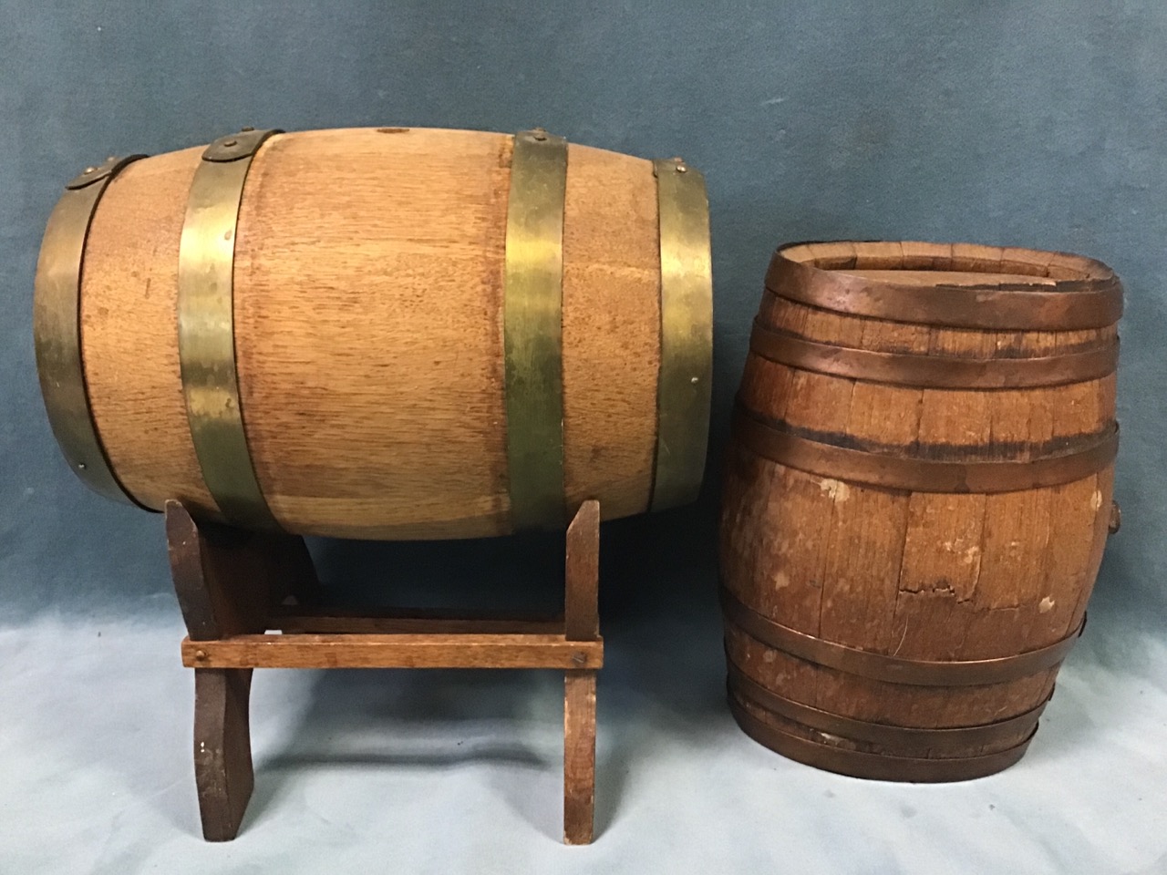 An oak and brass coopered spirit barrel on stand; an oval oak barrel with copper bands; and a - Image 2 of 3