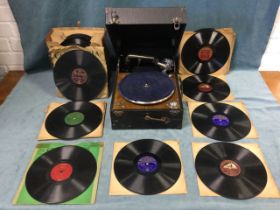 A cased Columbia wind-up gramophone with crank handle; and a collection of 78s - dance, choirs,