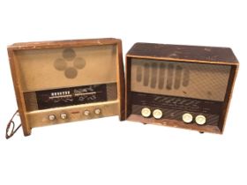 A 1950s Ferranti valve radio in a mahogany case with glass dial and bakelite knobs - 18in x 9in x