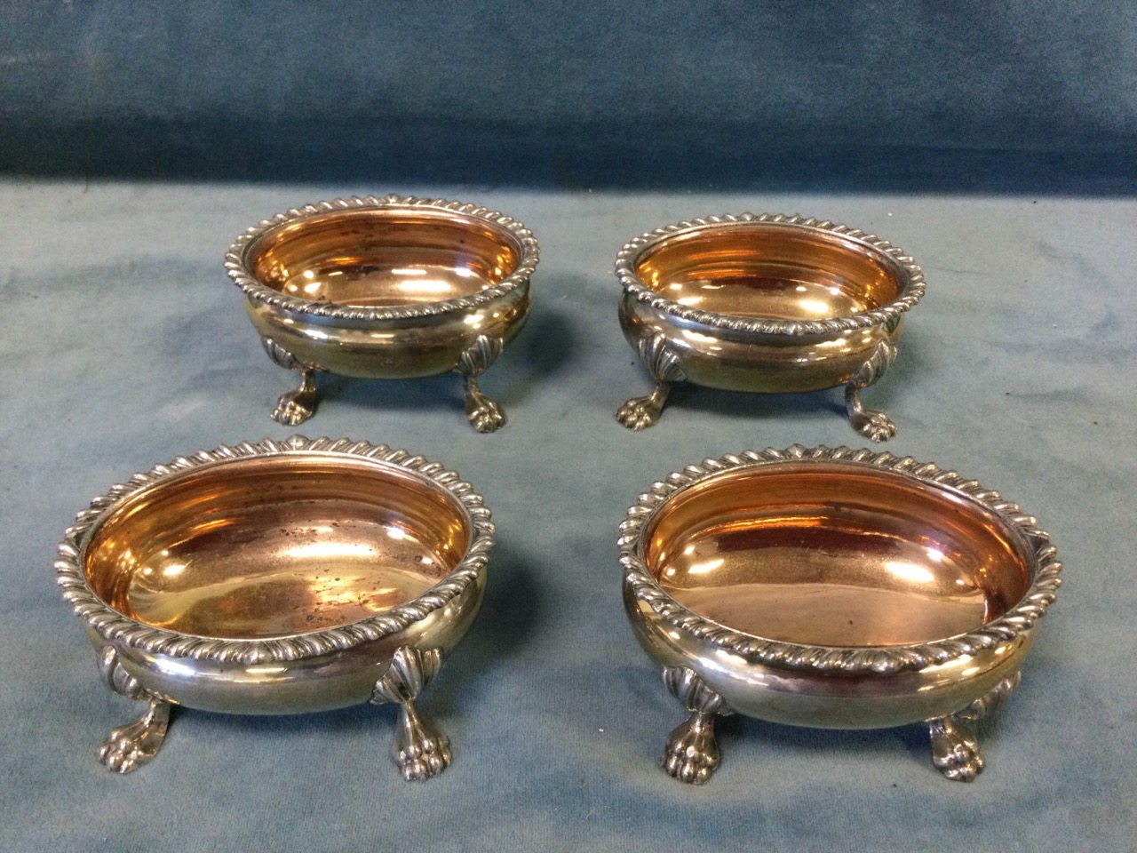A set of four Victorian oval silver plated salts with gadrooned rims on paw feet; a pair of pheasant - Image 3 of 3