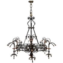 A massive Victorian wrought iron, copper and brass forty-eight lamp chandelier, the baluster and