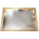 A contemporary gilt framed mirror in foliate moulded frame. (27.75in x 39.5in)