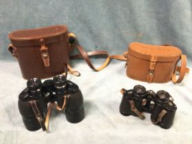 A pair of leather cased Carl Zeiss 8 x 30 Jena Deltrintem binoculars; and another leather cased 12 x