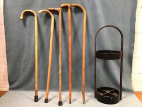 A circular bentwood and metal umbrella stand - 26in; and five various bentwood, carved and natural
