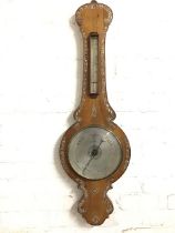 A Victorian rosewood barometer by J Gilmour & Co of Glasgow, the banjo shaped case inlaid with