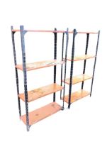 A pair of dexion type rectangular shelf units, each with four shelves. (32in x 12in x 64.75in) (2)