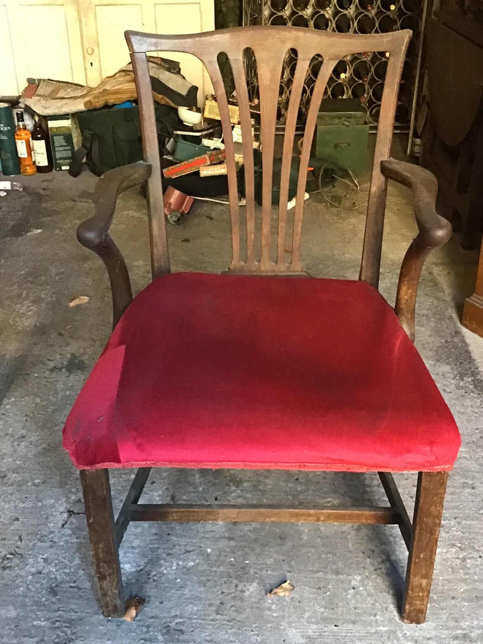 An eighteenth century mahogany elbow chair with pierced splat and shaped arms above a stuffover - Image 3 of 3