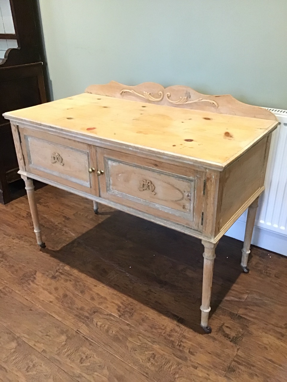 A painted pine washstand with applied ribbon and scrolled decoration, having shaped back and moulded - Image 3 of 3