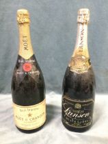 A magnum bottle of Moët & Chandon champagne, circa 1970 ?; and a similar size bottle of Lanson Black