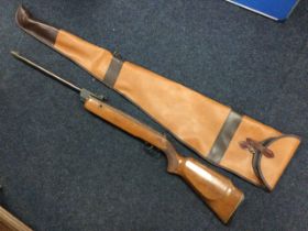 A British made .22 air rifle with beech stock, labelled Series 70 model 79, with contemporary sleeve