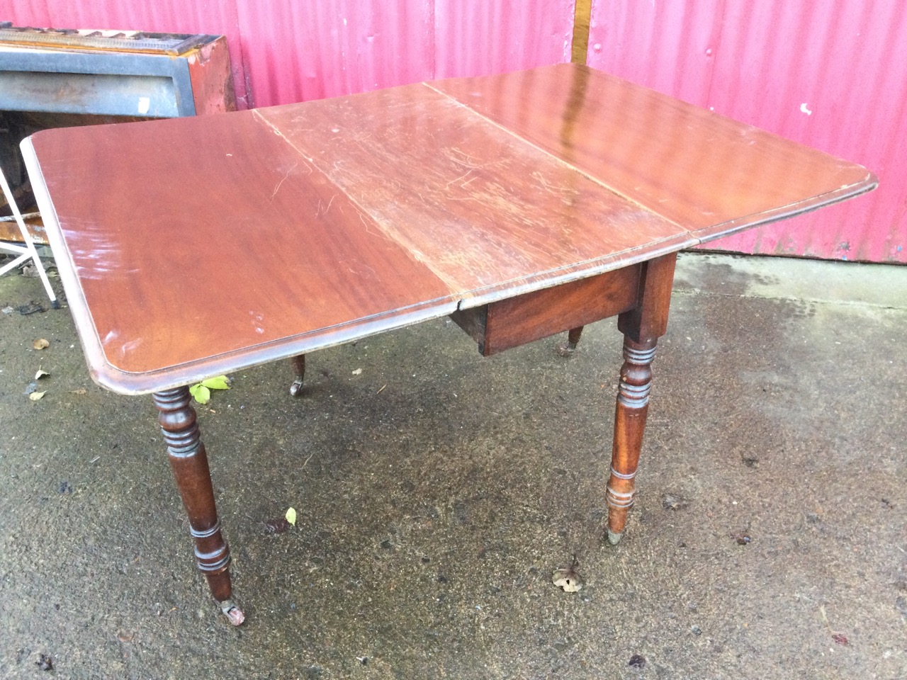 A Victorian mahogany drop leaf dining table, the moulded rectangular top with two leaves opening - Image 2 of 3