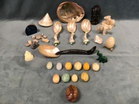 Miscellaneous shells, minerals and carved stone, including marble, calcite and agate eggs, an