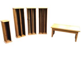 A rectangular heavy contemporary oak coffee table - 35.5in; three pine double CD racks - 39.5in; and