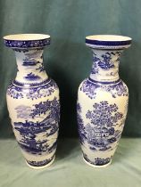 A pair of large blue & white Chinese porcelain vases decorated with continuous water landscape