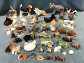 Miscellaneous ceramic and resin figures - dogs, birds, cats, rabbits, mice, tortoises, an