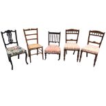 Five Edwardian chairs - a mahogany upholstered nursing chair with spindle back, a beech bedroom