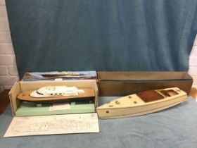 A 1950s boxed Kellner model boat, the launch type cruiser with painted hull, brass mounts,
