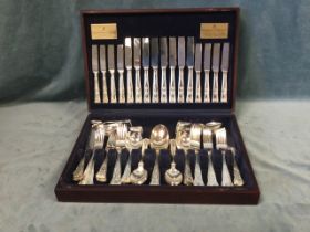 A cased canteen of silver plated cutlery in the queens shell pattern, the set by Viners with 100