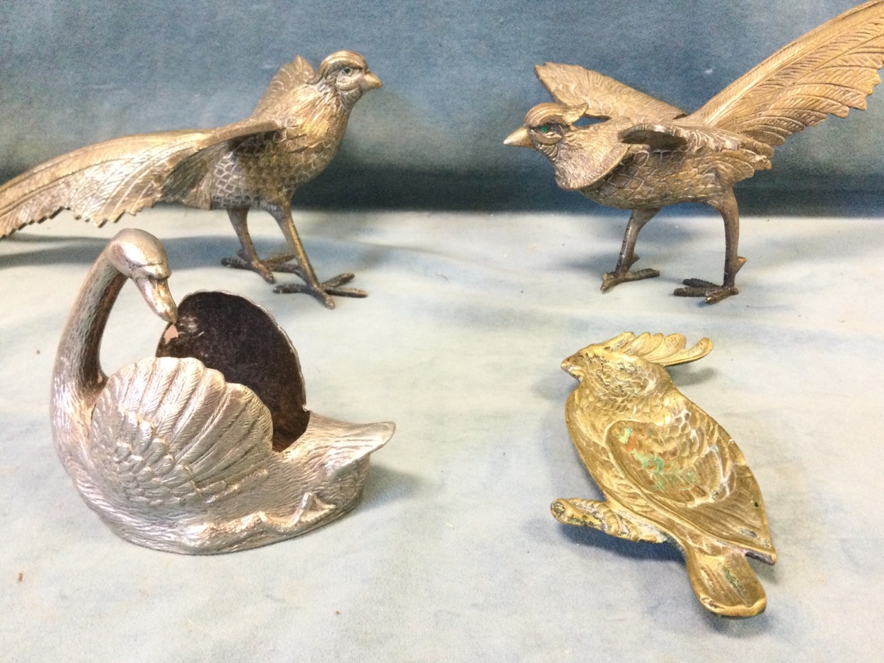 A set of four Victorian oval silver plated salts with gadrooned rims on paw feet; a pair of pheasant - Image 2 of 3