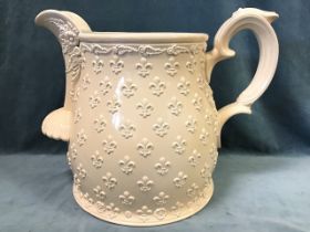 A large Peter Weldon creamware Staffordshire oversize 30litre jug, the body with overall relief