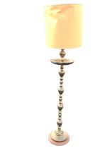 A brass Ottoman style mosque candlestick, the nozzle, drip tray and bobbin-turned column chased with