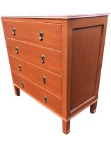 A painted oak chest of drawers with rectangular moulded top above four long drawers mounted with