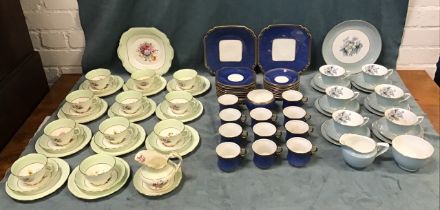 A Royal Worcester porcelain tea service in the Woodland pattern; a Hammersley porcelain teaset