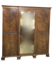 A late Victorian mahogany combination wardrobe by Sopwith & Co, with lozenge and pelmet cornice