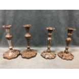 A pair of Victorian silver plated candlesticks, the foliate columns on vine cast bases - 8.5in;