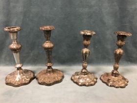 A pair of Victorian silver plated candlesticks, the foliate columns on vine cast bases - 8.5in;