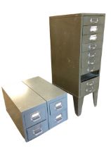 A metal four-drawer file cabinet with chromed label handles - 16.25in x 20in x 11in; and a ten-
