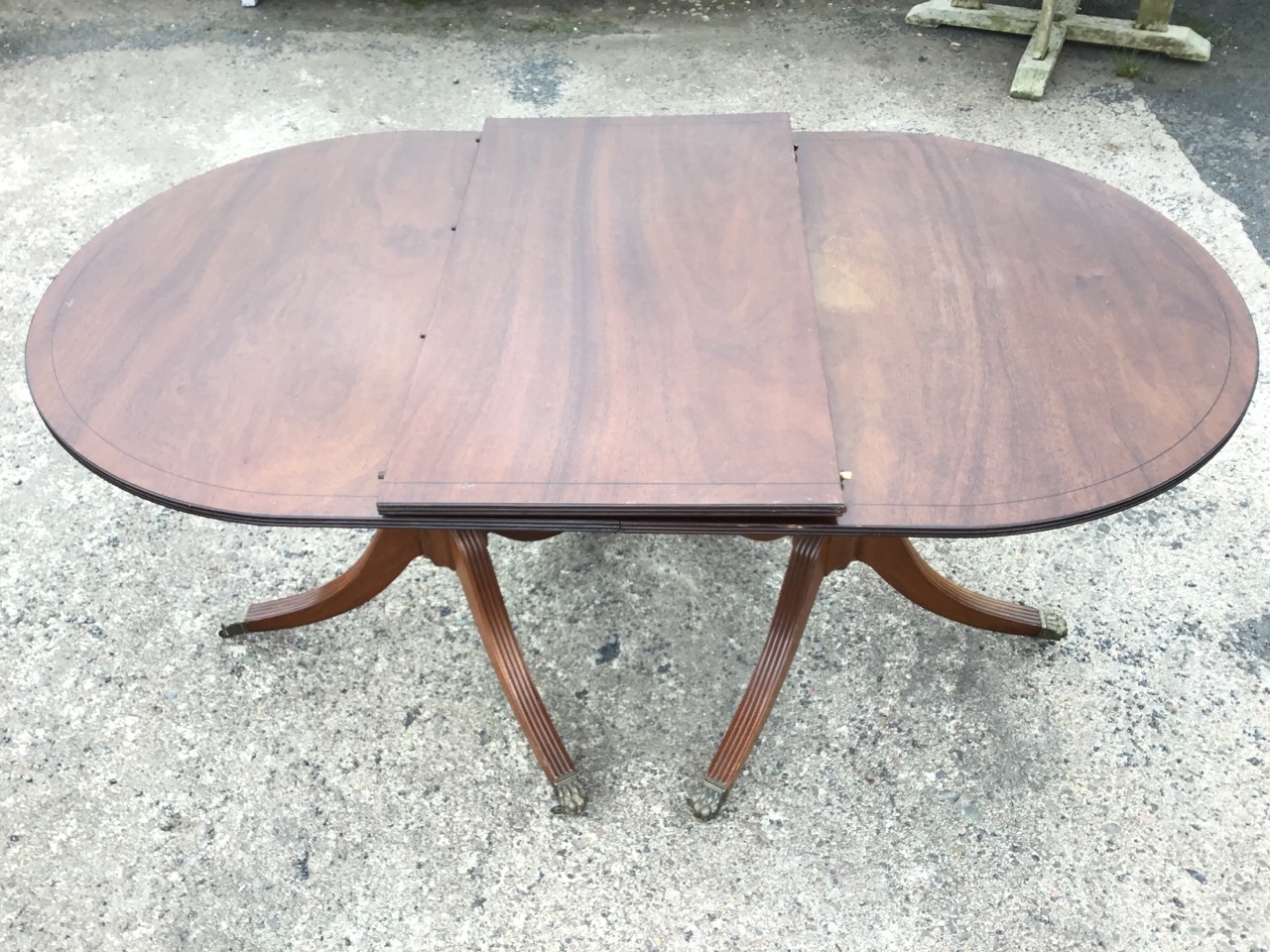 A Georgian style mahogany extending twin pedestal dining table, the crossbanded top with reeded edge - Image 3 of 3